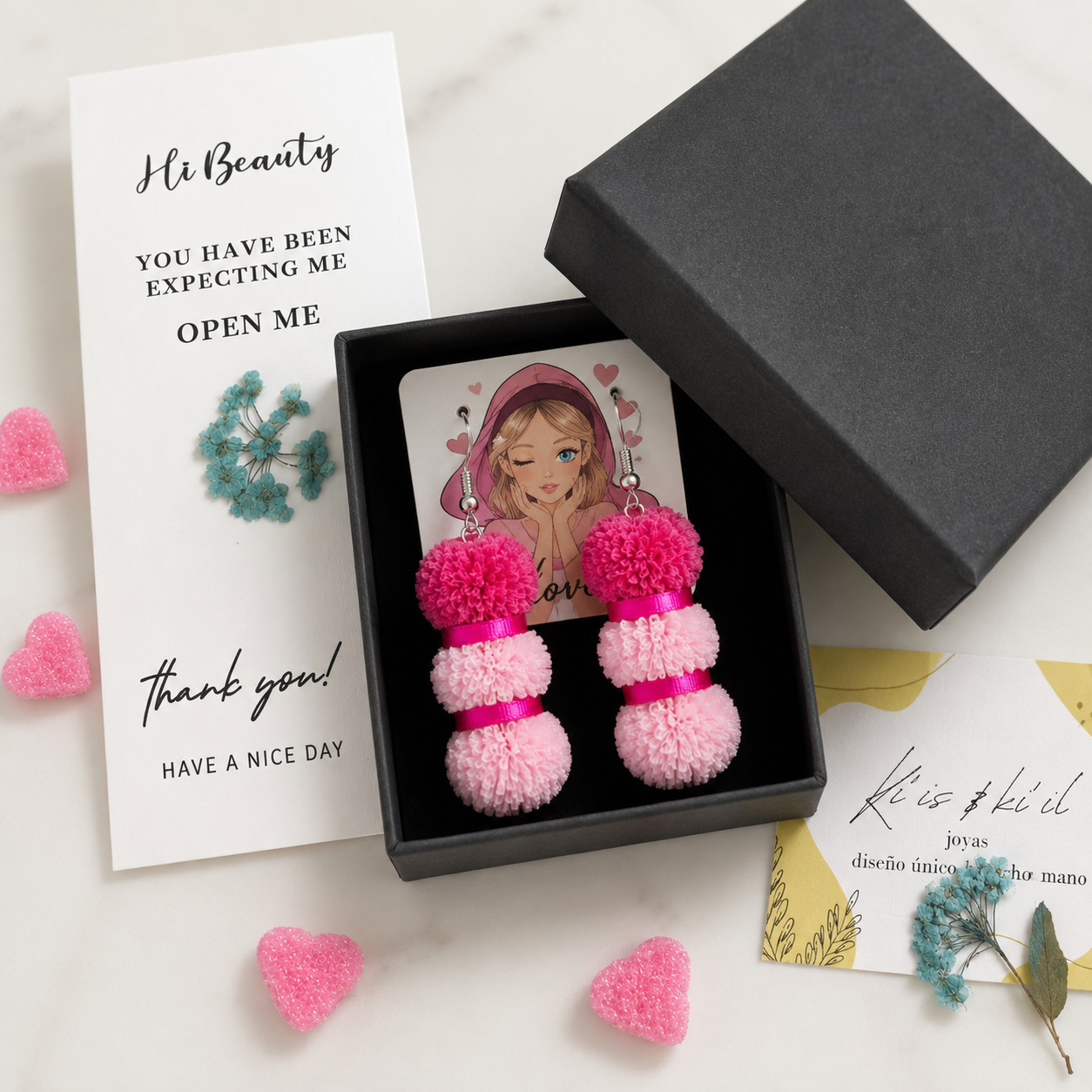 Pendientes de plata con pompones rosa