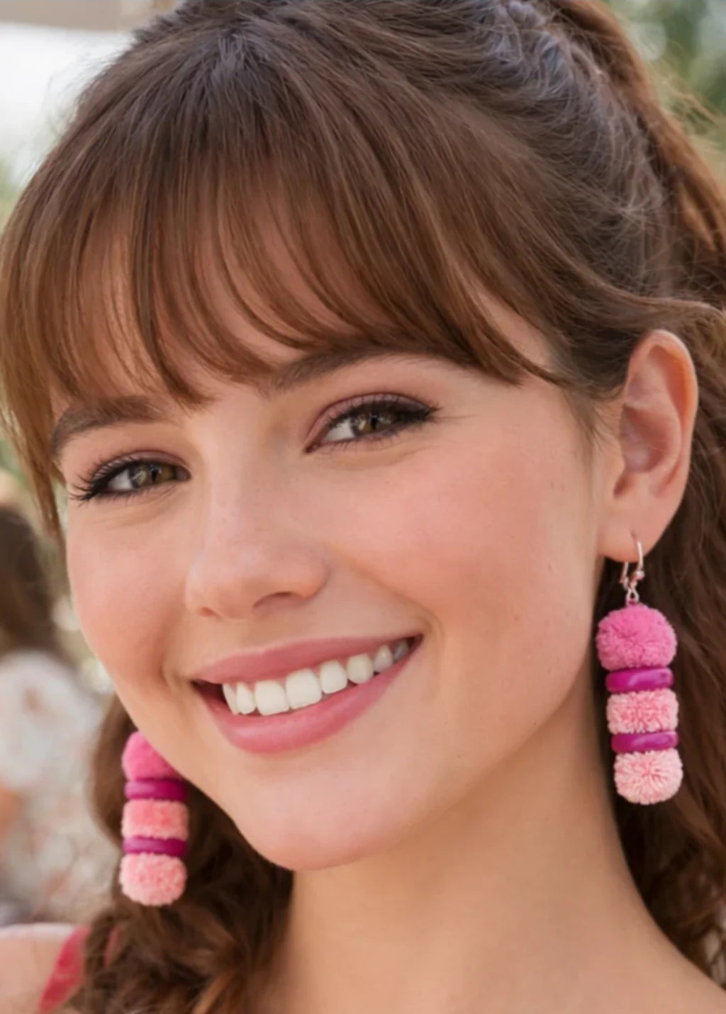 Pendientes de plata con pompones rosa